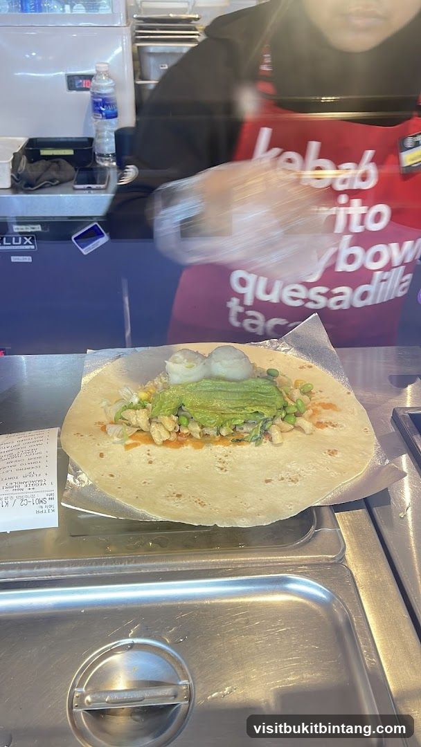 Burrito being prepared