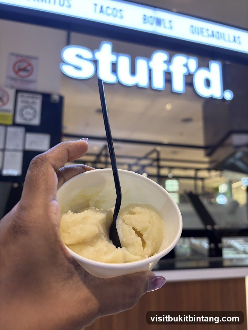 Ice cream cup with a spoon