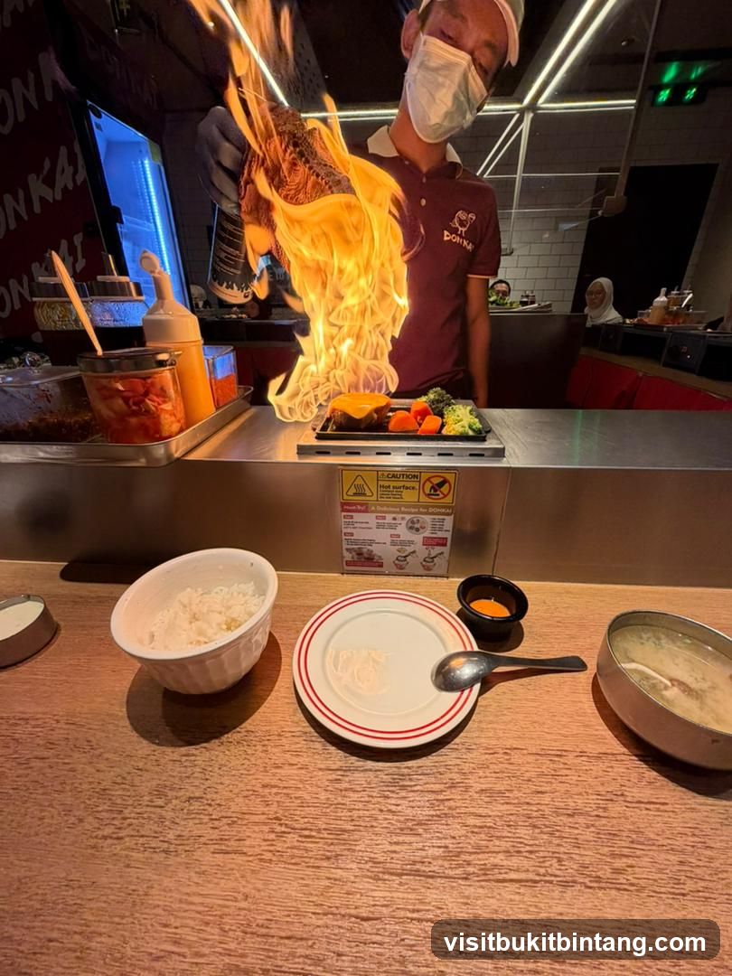 Chef flambéing food