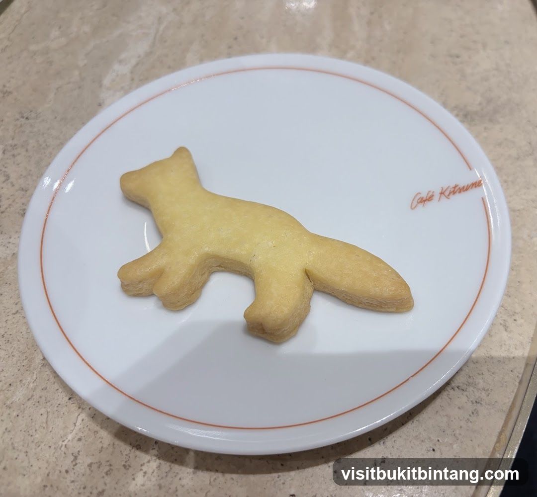 Fox-shaped cookie on a plate