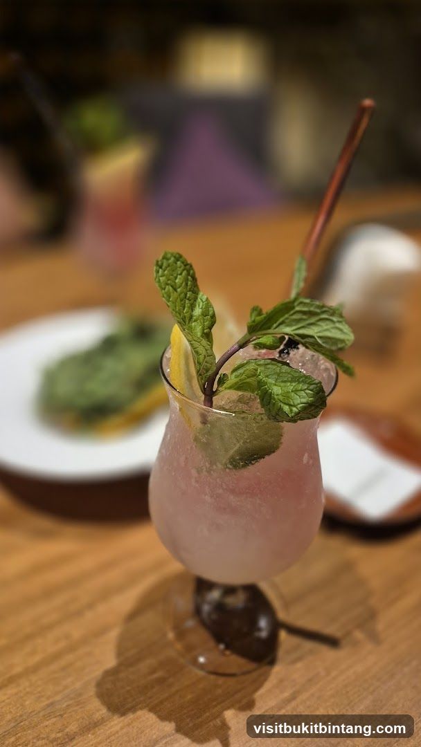 Pink Cocktail with Mint and Lemon