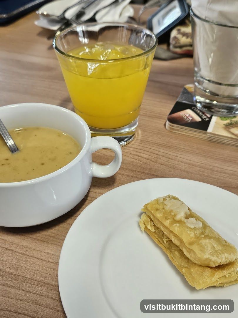 Soup, Pastry, and Orange Juice