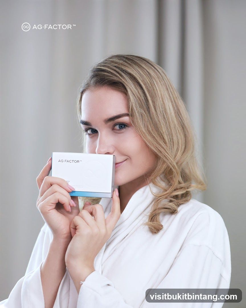 Woman holding AG-FACTOR box