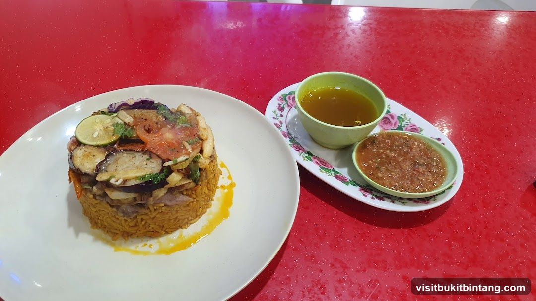 Rice dish with vegetables and dipping sauces