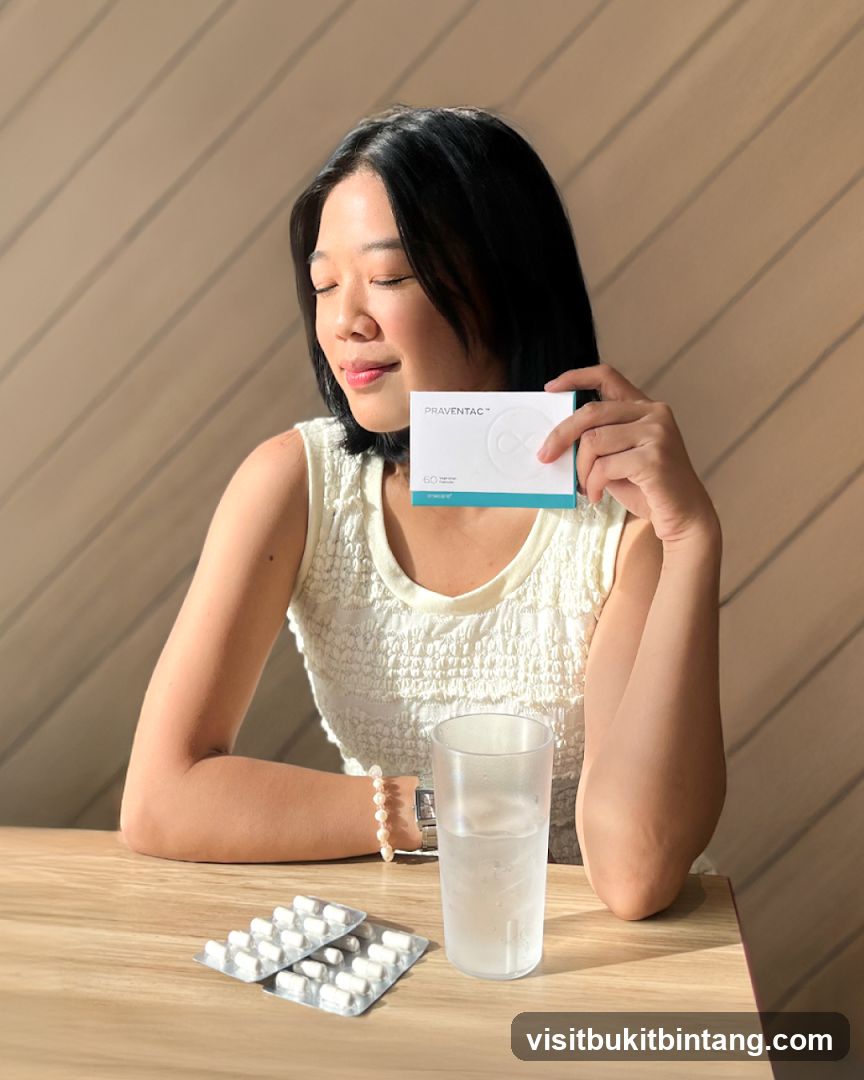 Woman holding a box of Praventac