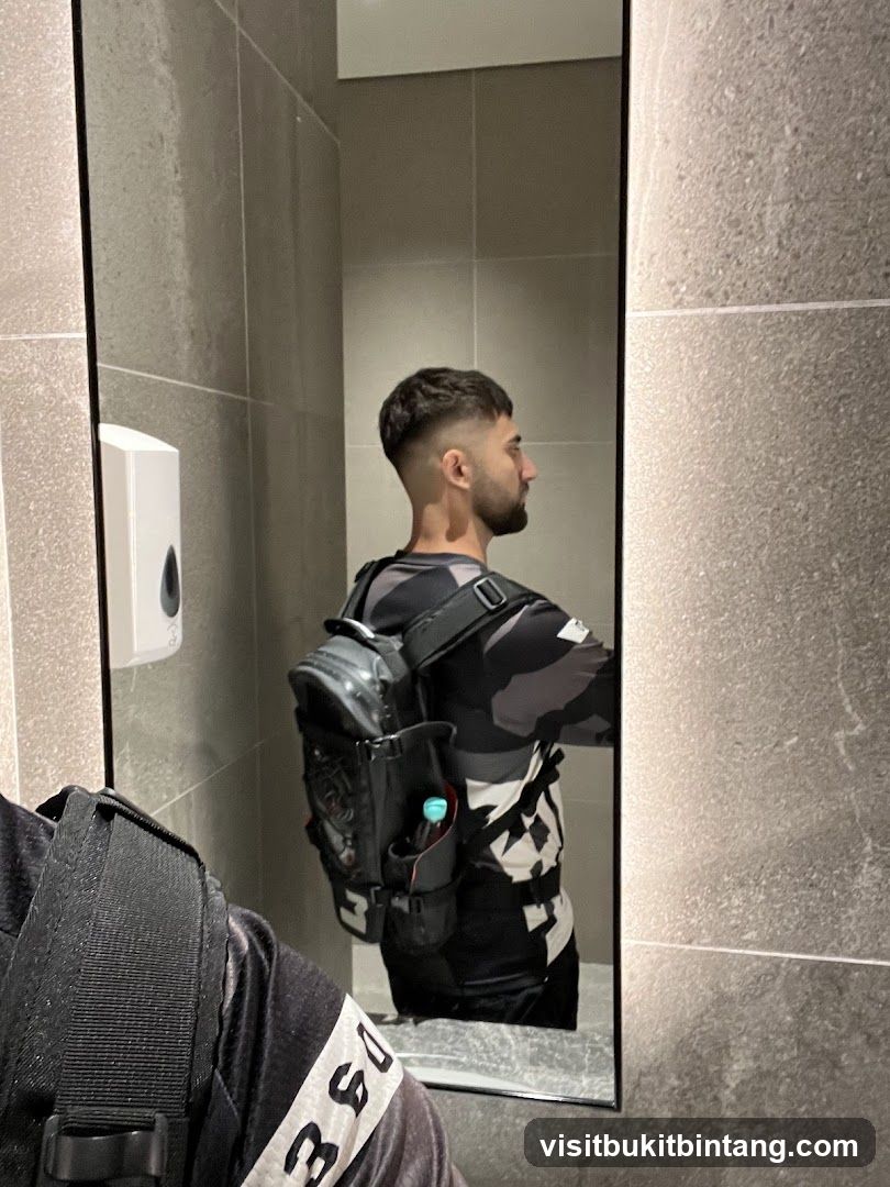 Man in Camouflage Shirt and Backpack