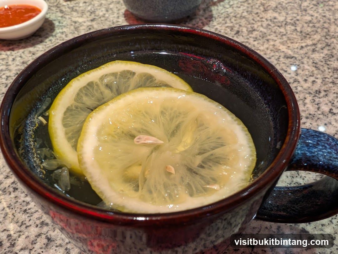 Lemon Water in a Mug