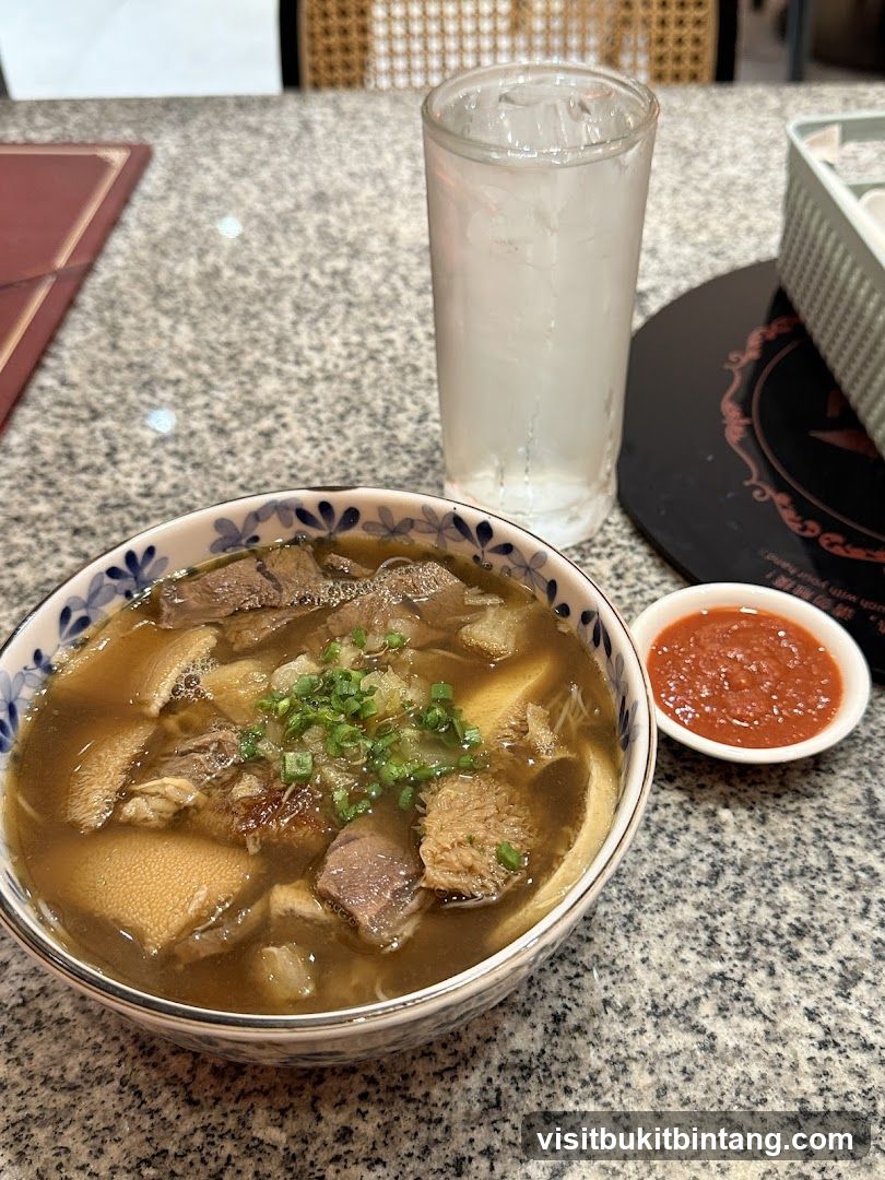 Beef noodle soup with chili sauce