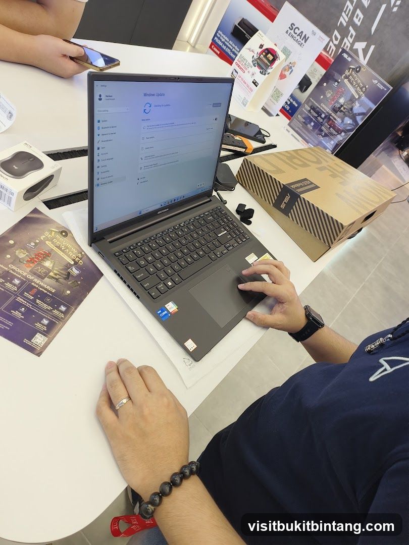 Laptop with Windows Update screen