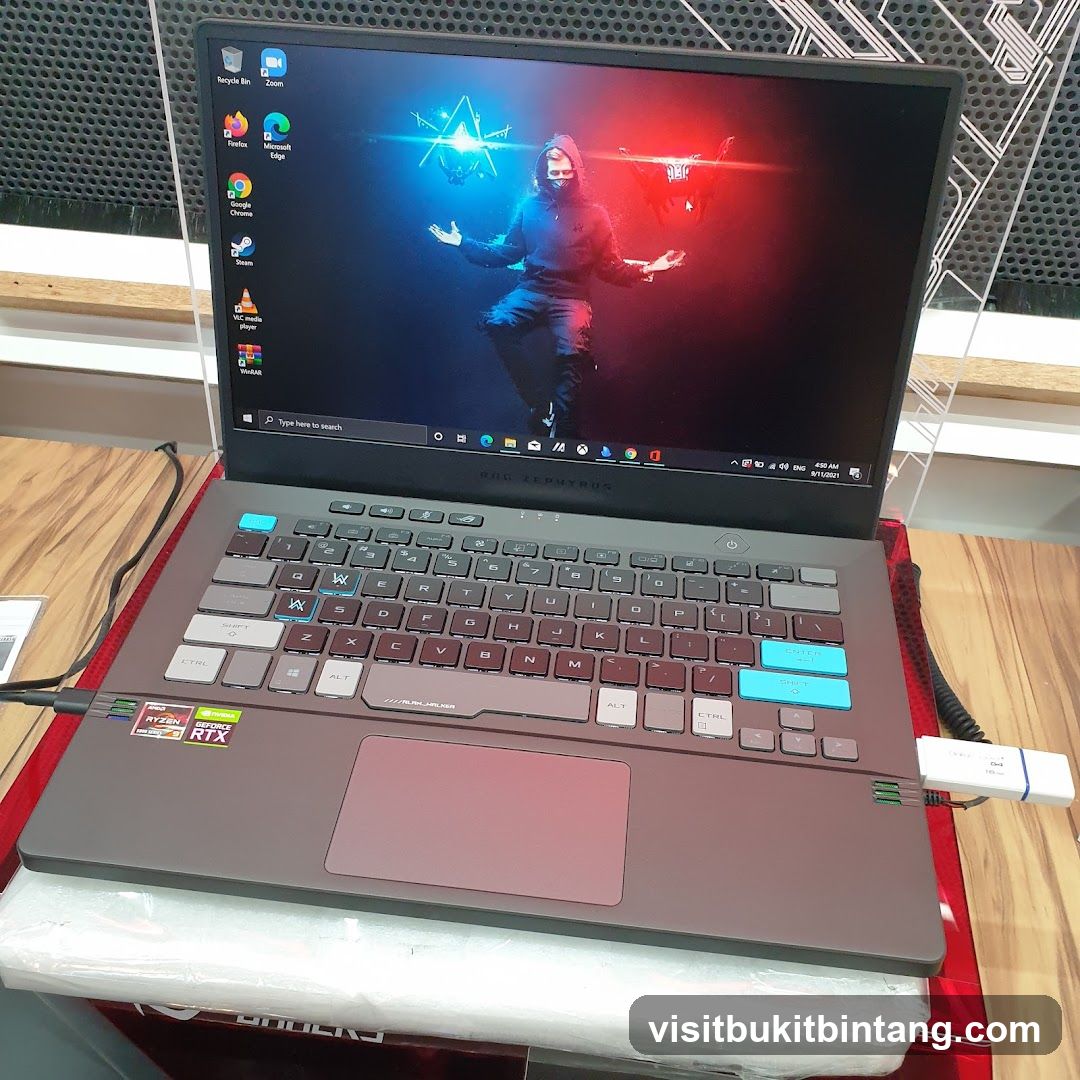 Laptop with Gaming Wallpaper