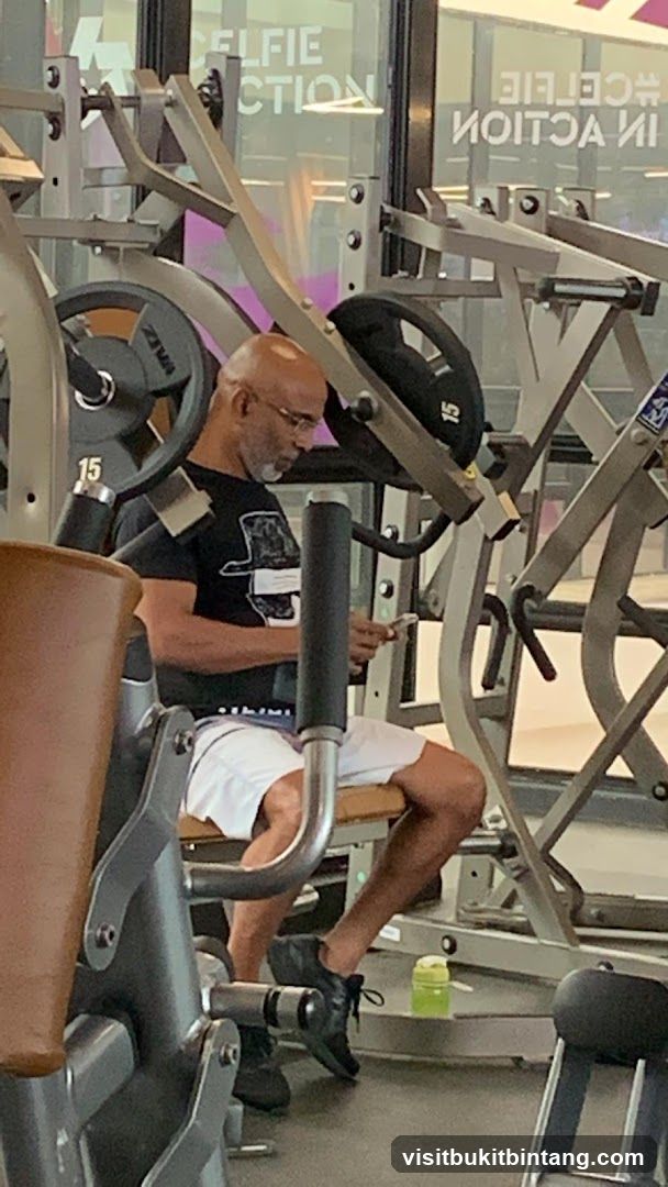 Man on gym equipment