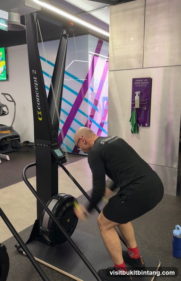 Man using a ski erg machine