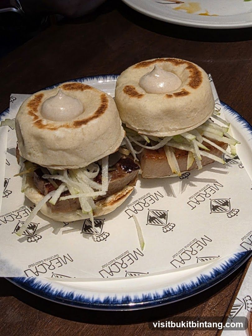 Two mini burgers on a plate