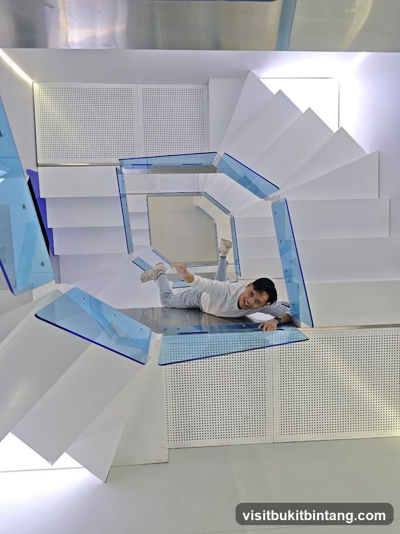 Man posing on a modern staircase