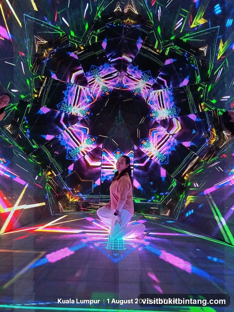 Woman Posing in a Digital Art Installation