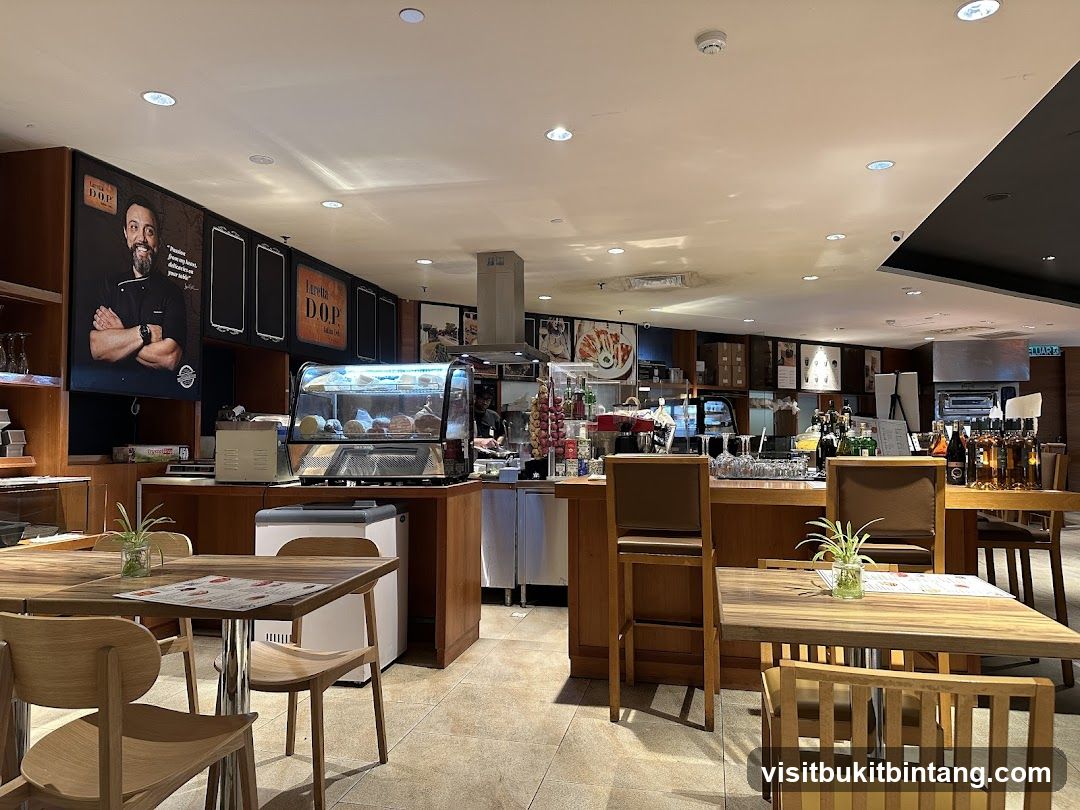 Interior of a cafe with seating and display cases