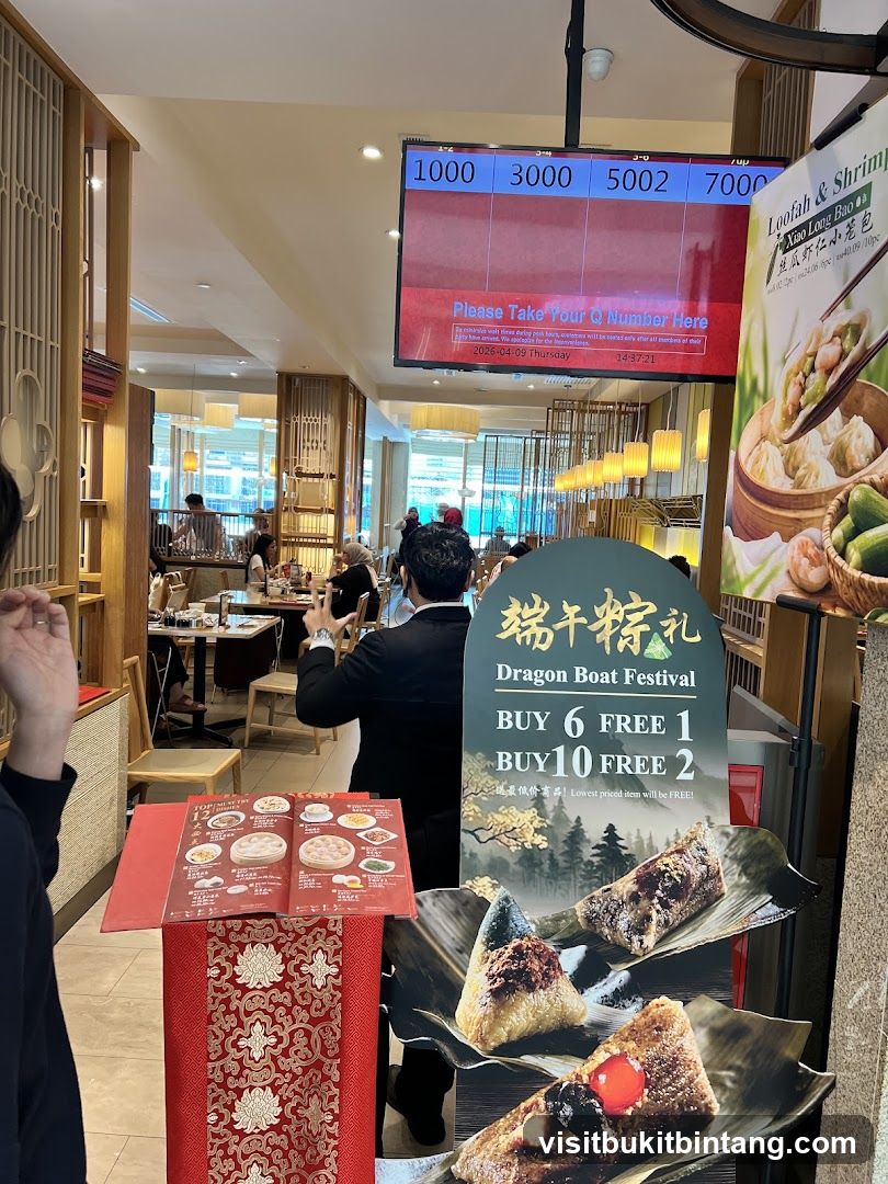 Restaurant Interior with Queue Display and Promotions