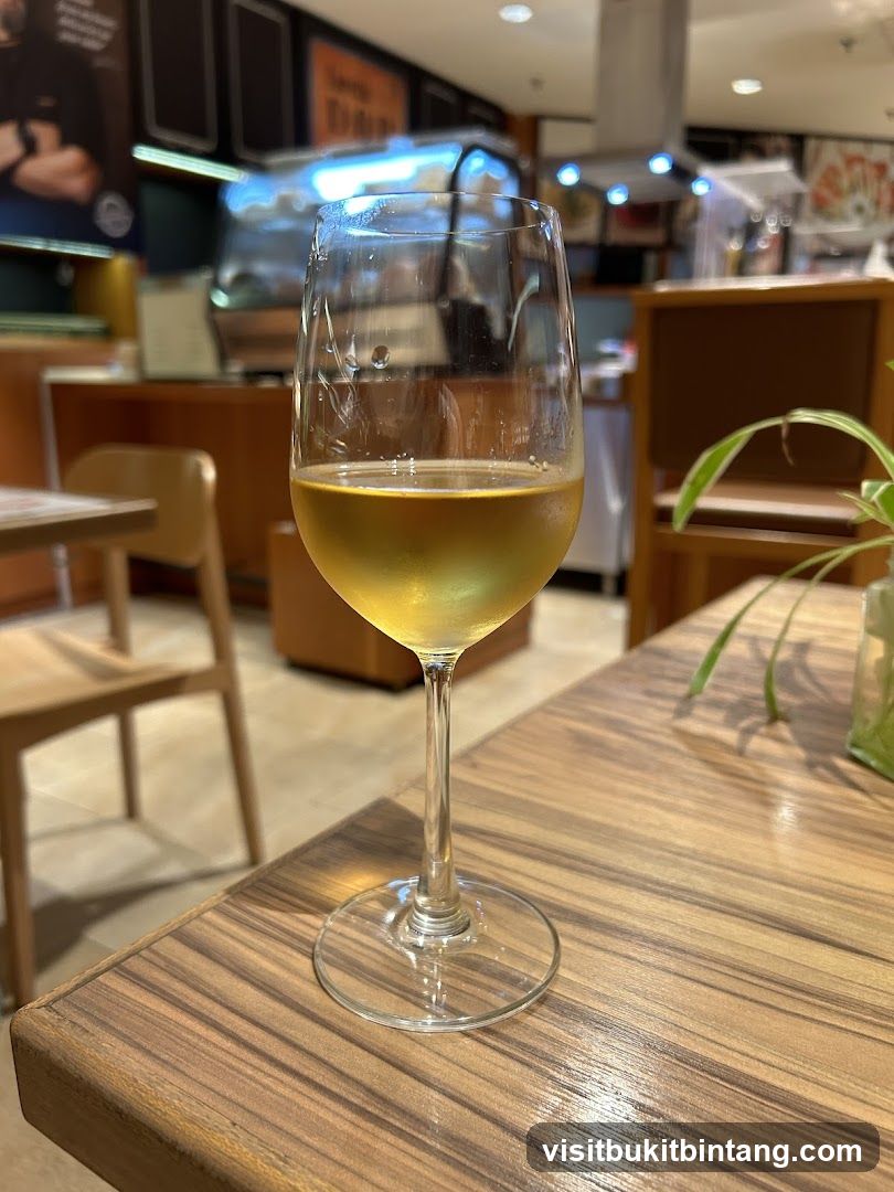 Glass of White Wine on Table