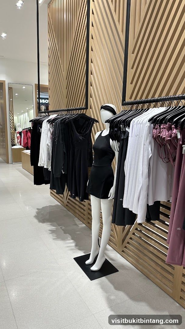 Clothing store display with mannequins and apparel