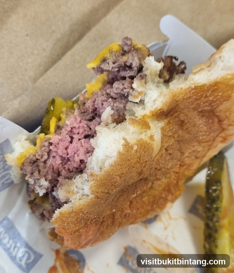 Partially Eaten Cheeseburger
