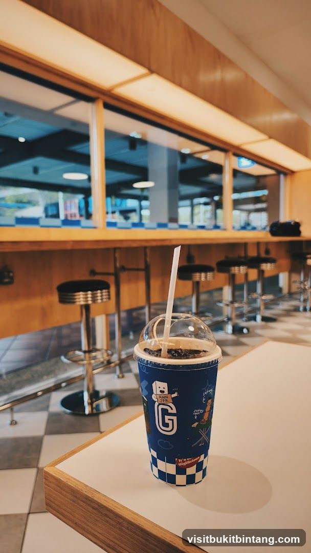 Beverage Cup with Straw on Table