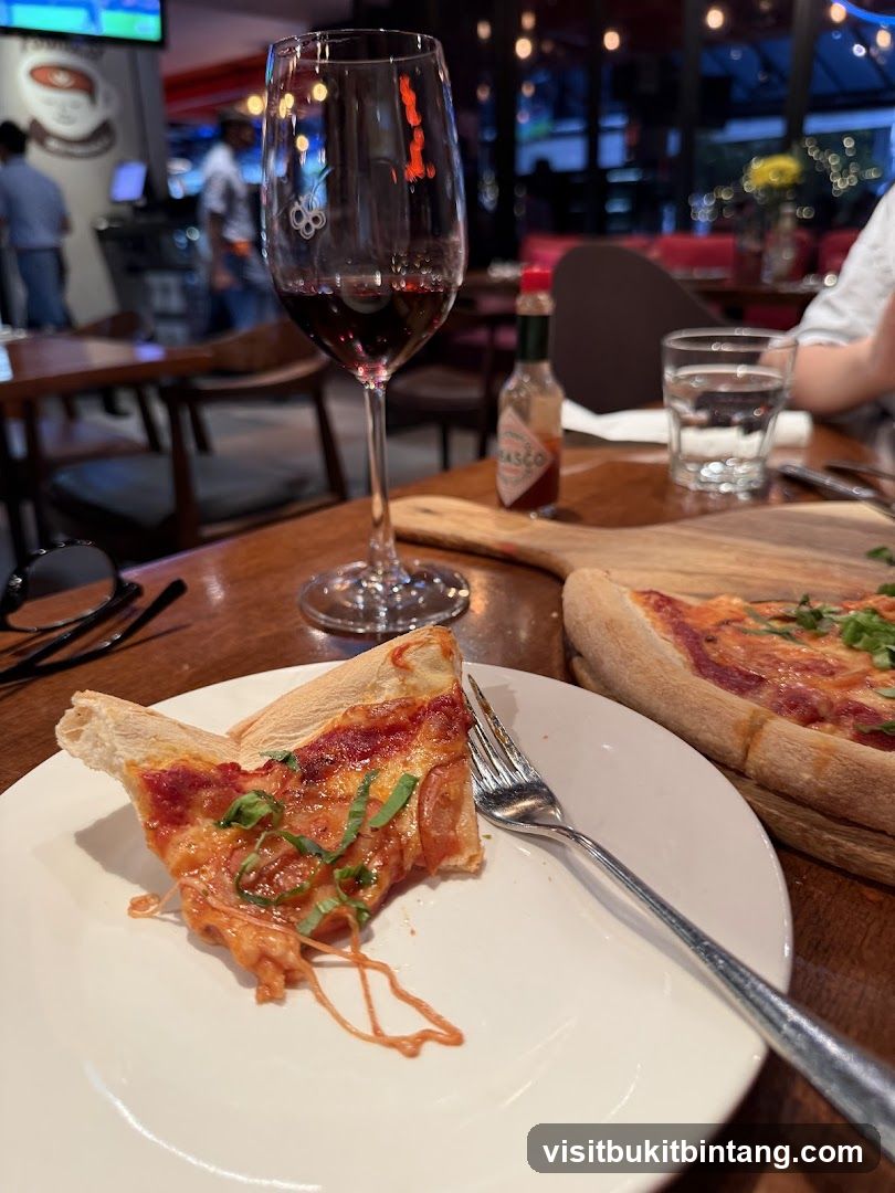 Pizza and Wine at a Restaurant
