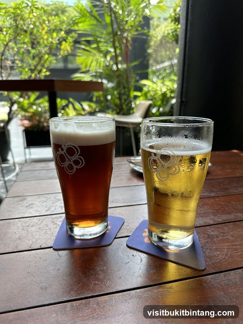 Two glasses of beer on a wooden table