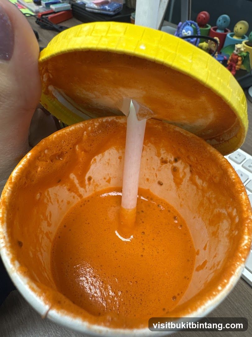 Orange Drink with Straw