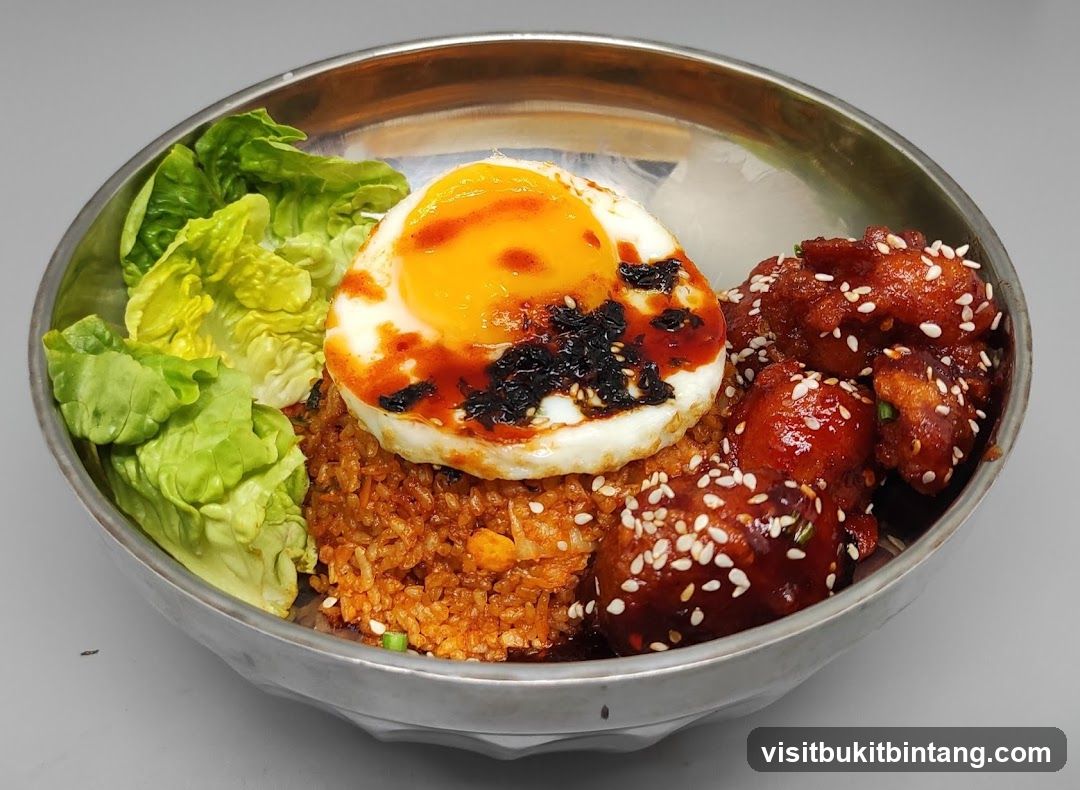 Fried Rice Bowl with Fried Egg and Chicken
