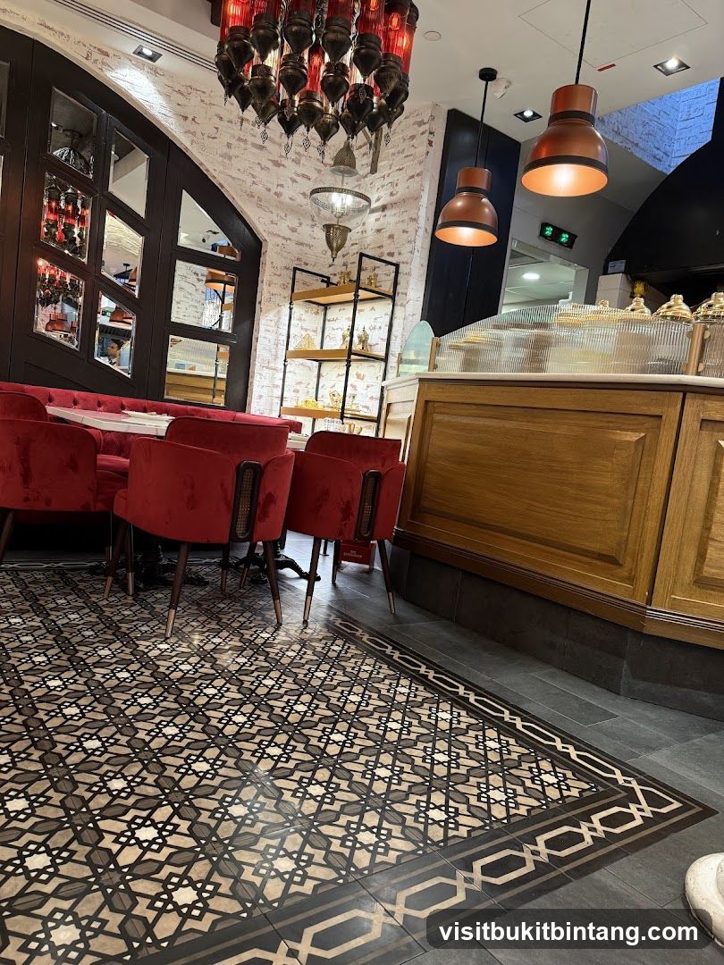 Restaurant Interior with Red Seating and Ornate Chandelier