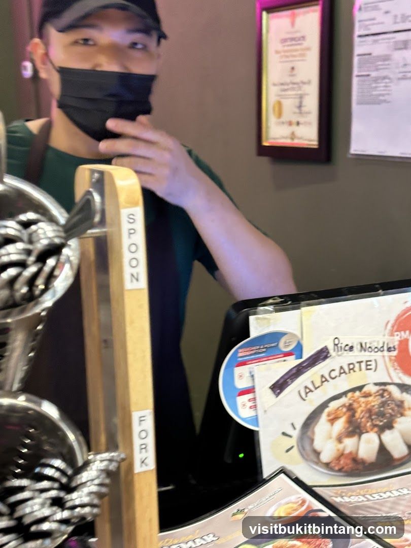 Staff member at a counter