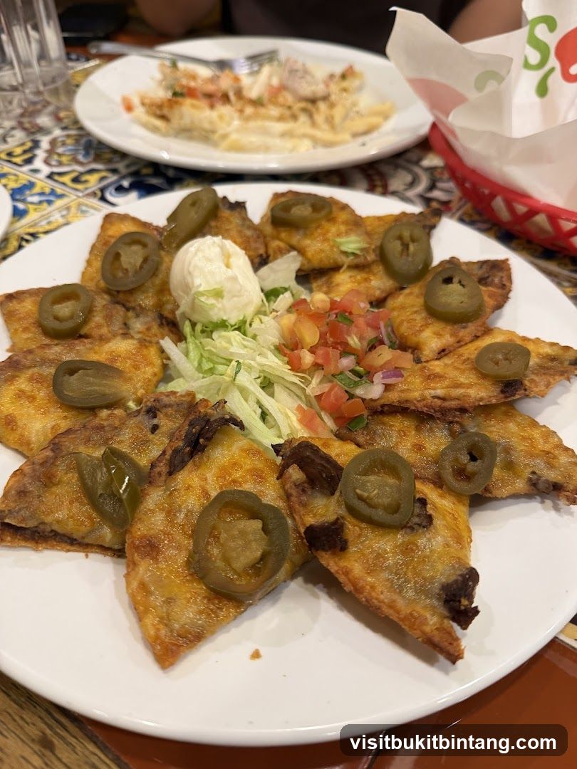 Nachos with Jalapenos and Sour Cream