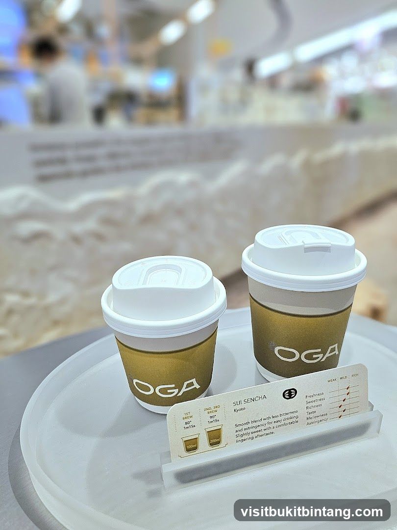 Two OGA Coffee Cups with Menu Card
