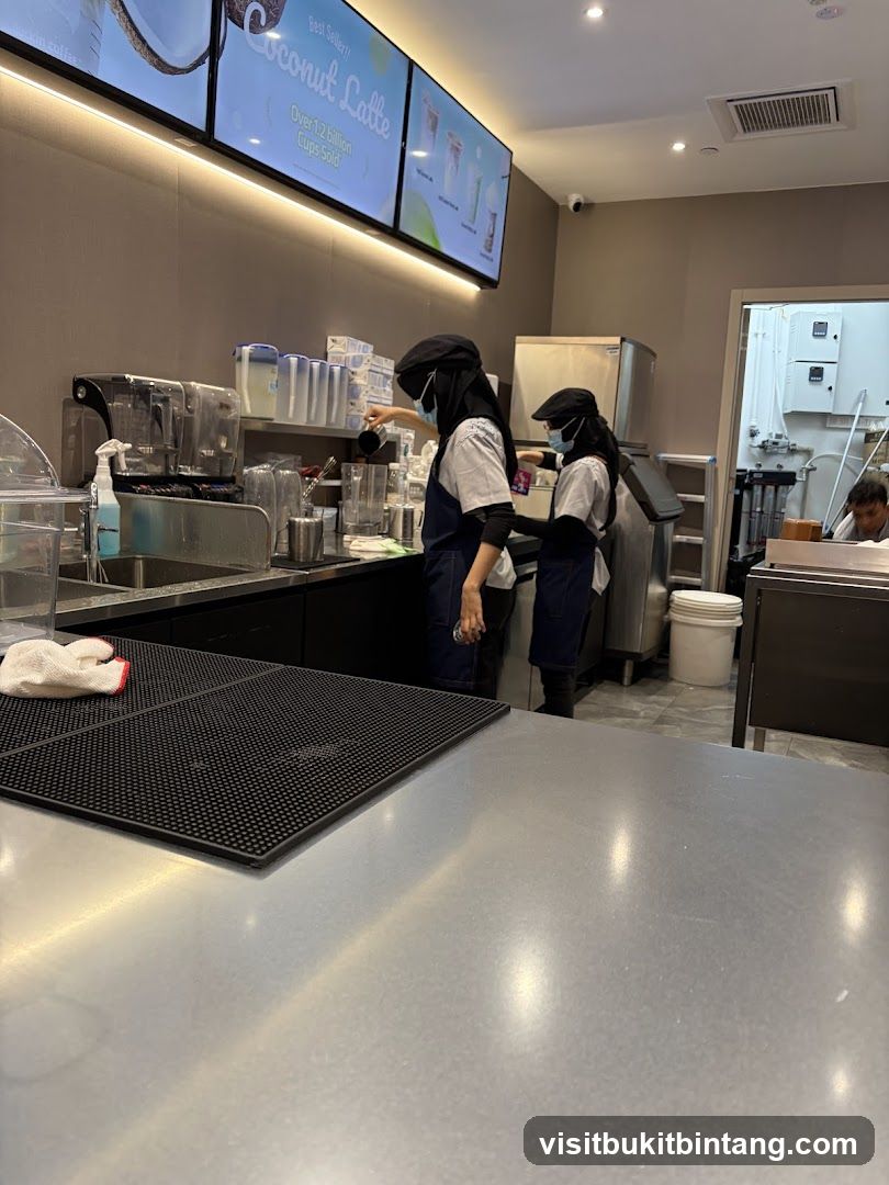 Baristas preparing drinks