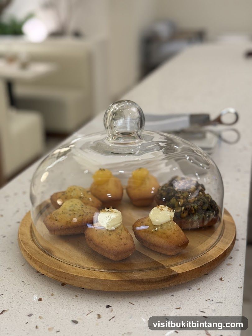 Madeleines under a glass dome