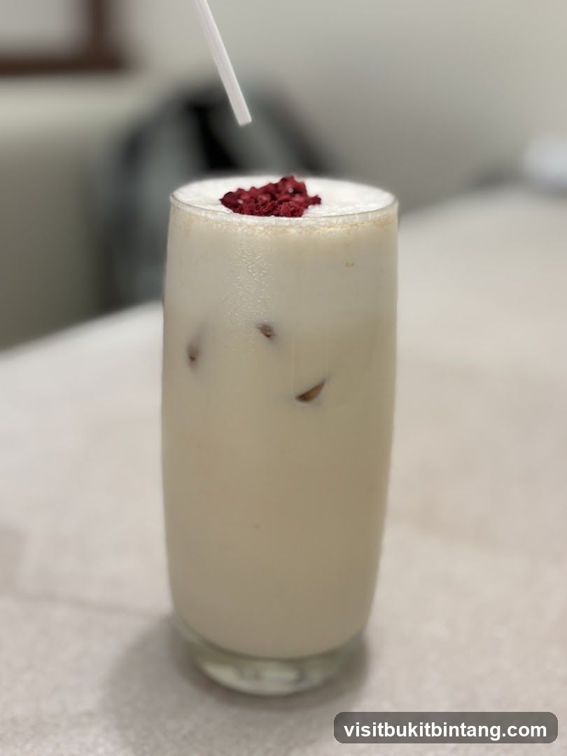 Creamy Drink with Red Garnish