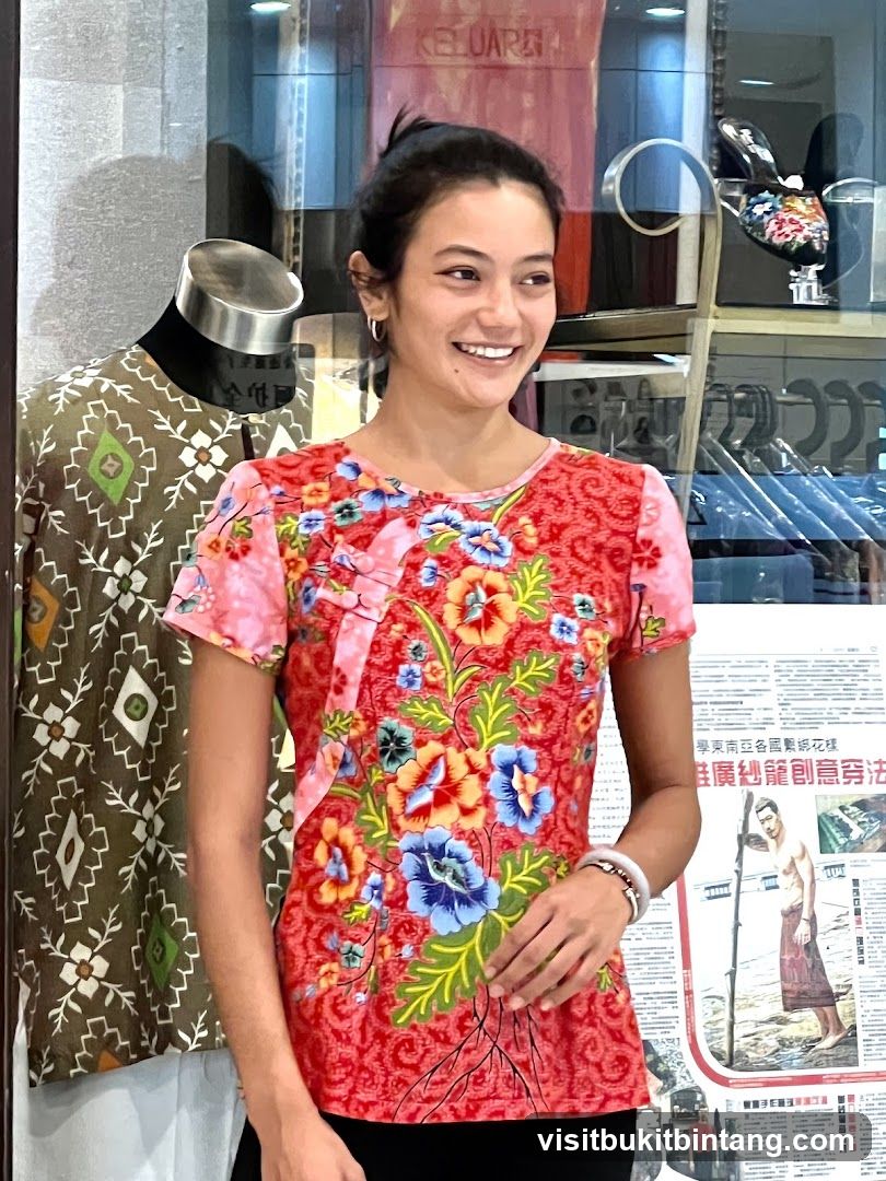 Woman in floral shirt