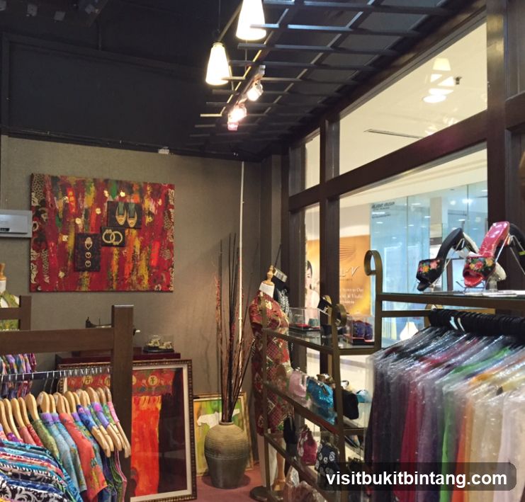 Clothing store interior with artwork and apparel