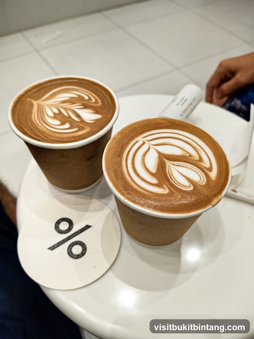 Two coffees with latte art