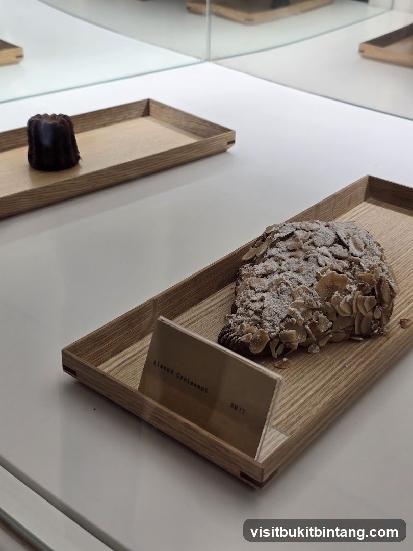 Almond Croissant and Canelé