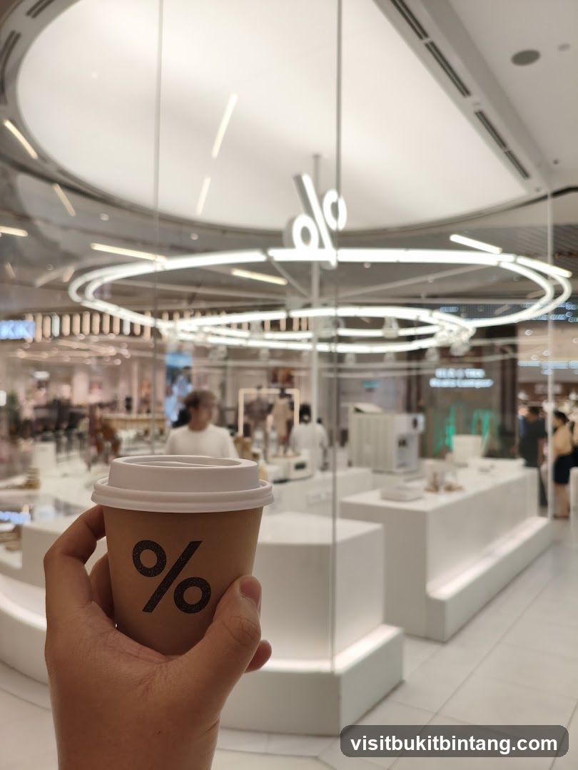 Coffee cup with % logo