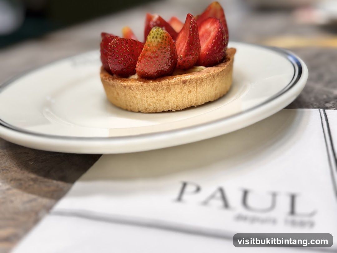 Strawberry Tart on a Plate with PAUL Napkin
