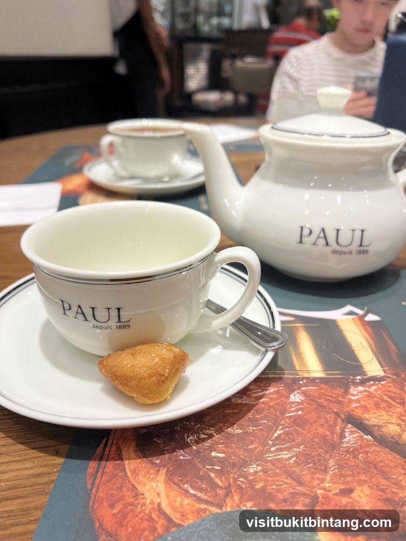 Tea set with a pastry