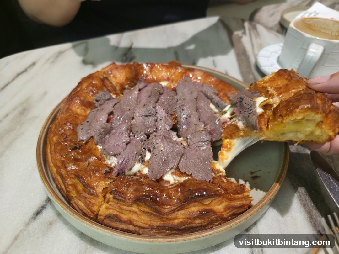 Savory Pastry with Sliced Meat and Cheese