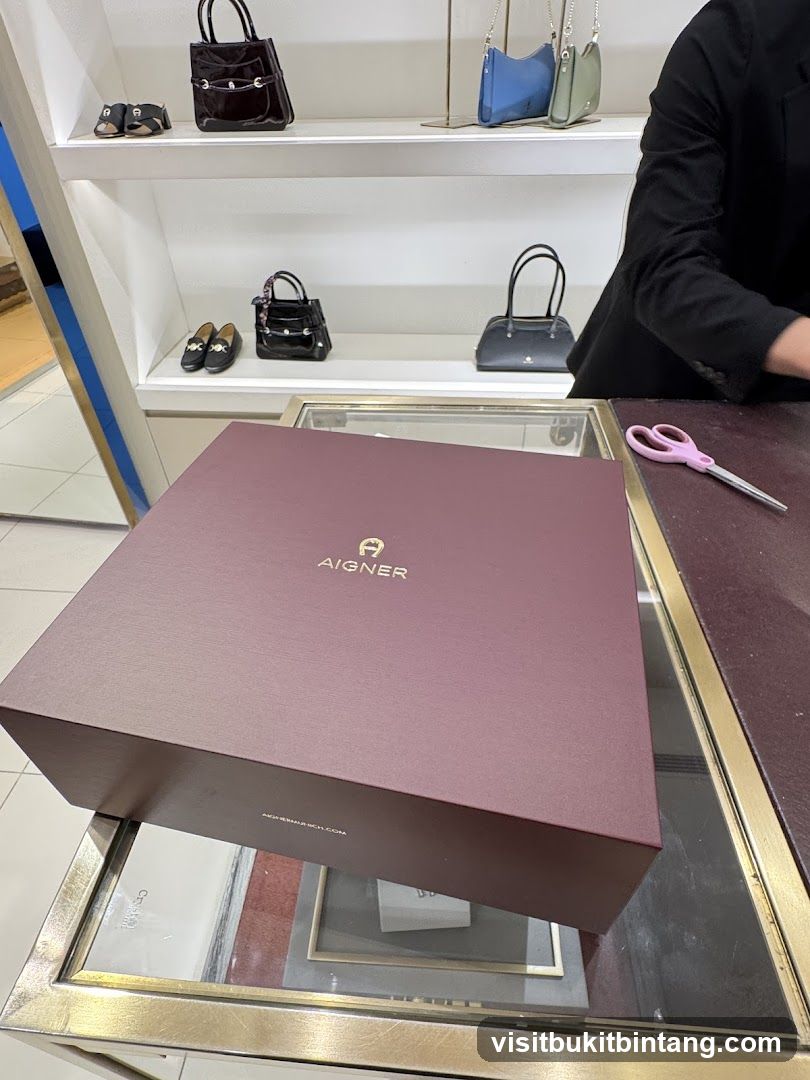 Aigner branded box on display