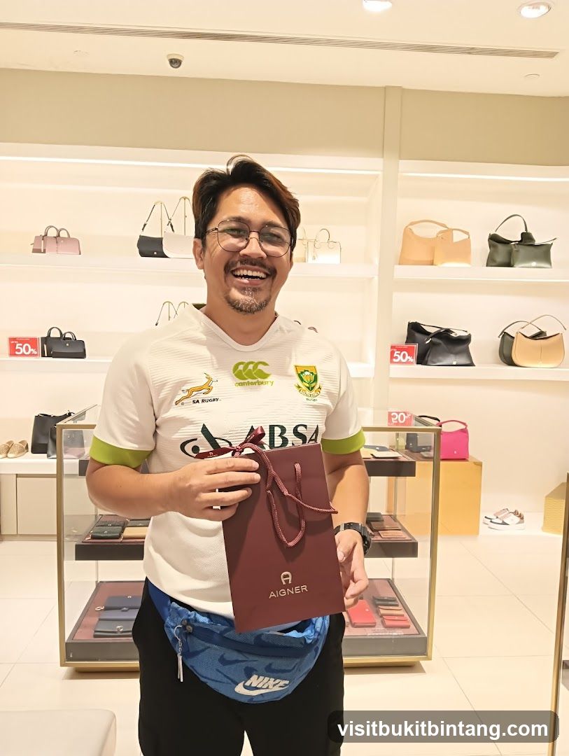 Man holding a shopping bag in a store