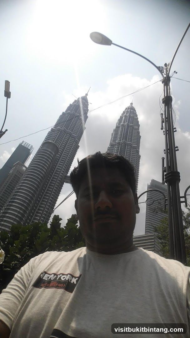 Man in front of Petronas Towers