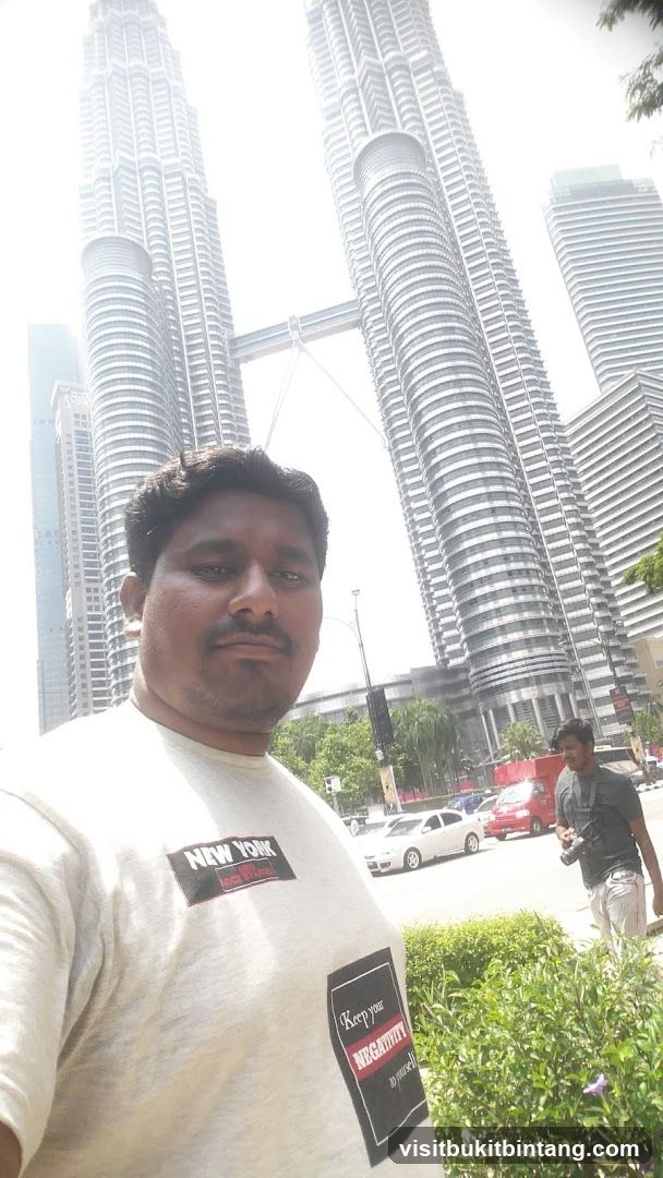 Man in front of Petronas Towers