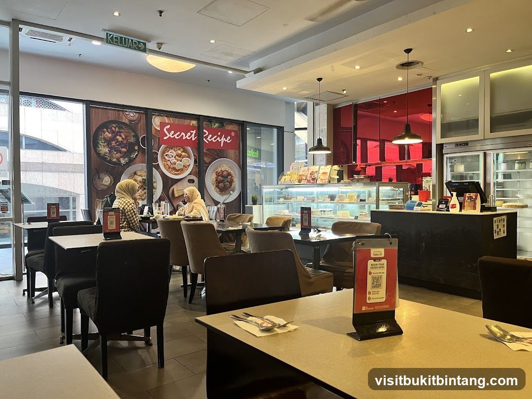 Interior of a cafe with seating and display cases
