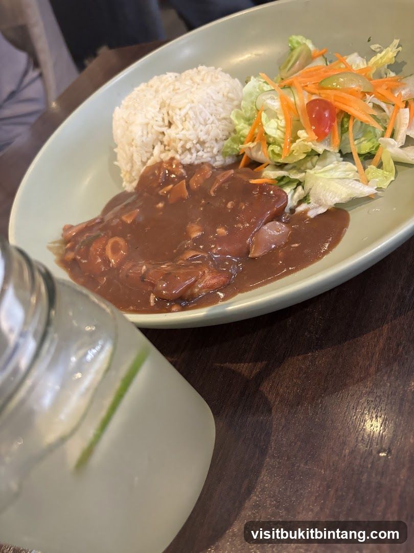 Steak with rice and salad